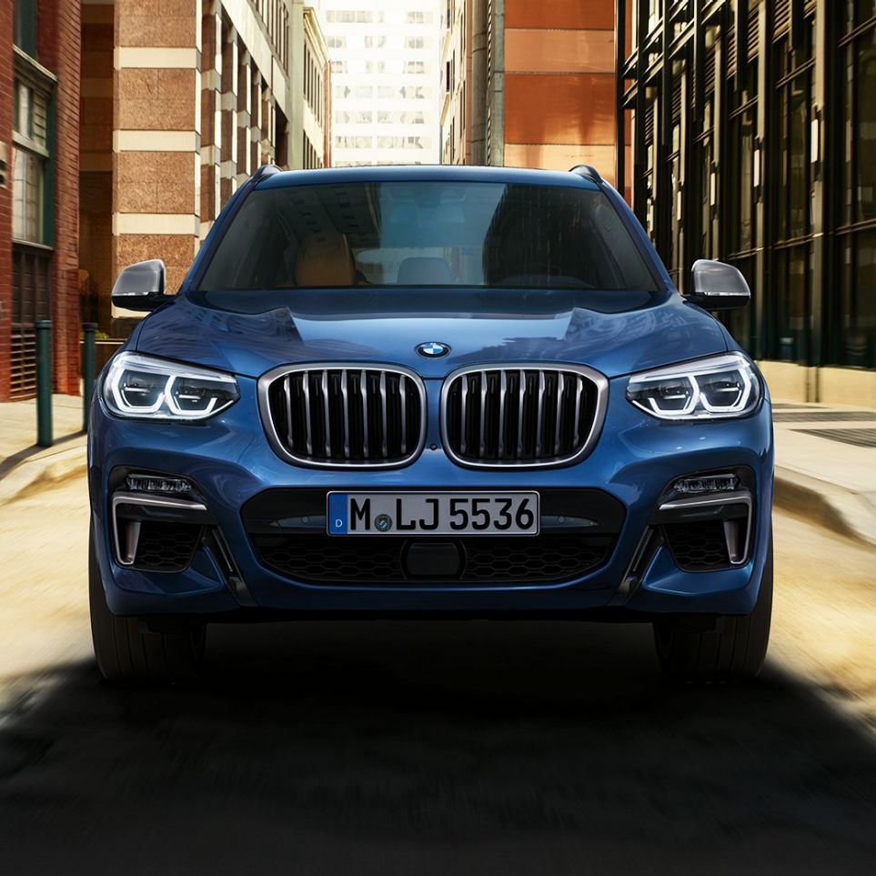 BMW X3 M40i, front shot in front of city scenery BMW X3 M40i, front shot in front of city scenery