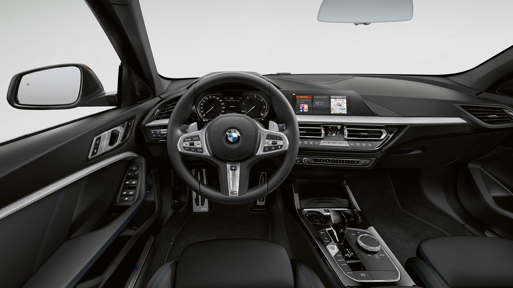 M Leather steering wheel. BMW 1 Series Model M Sport, cockpit with M Leather steering wheel.