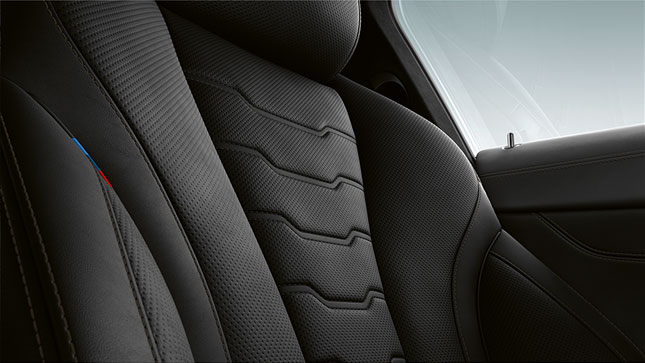 Close-up of upholstery and stitching of the BMW 8 Series Coupé.