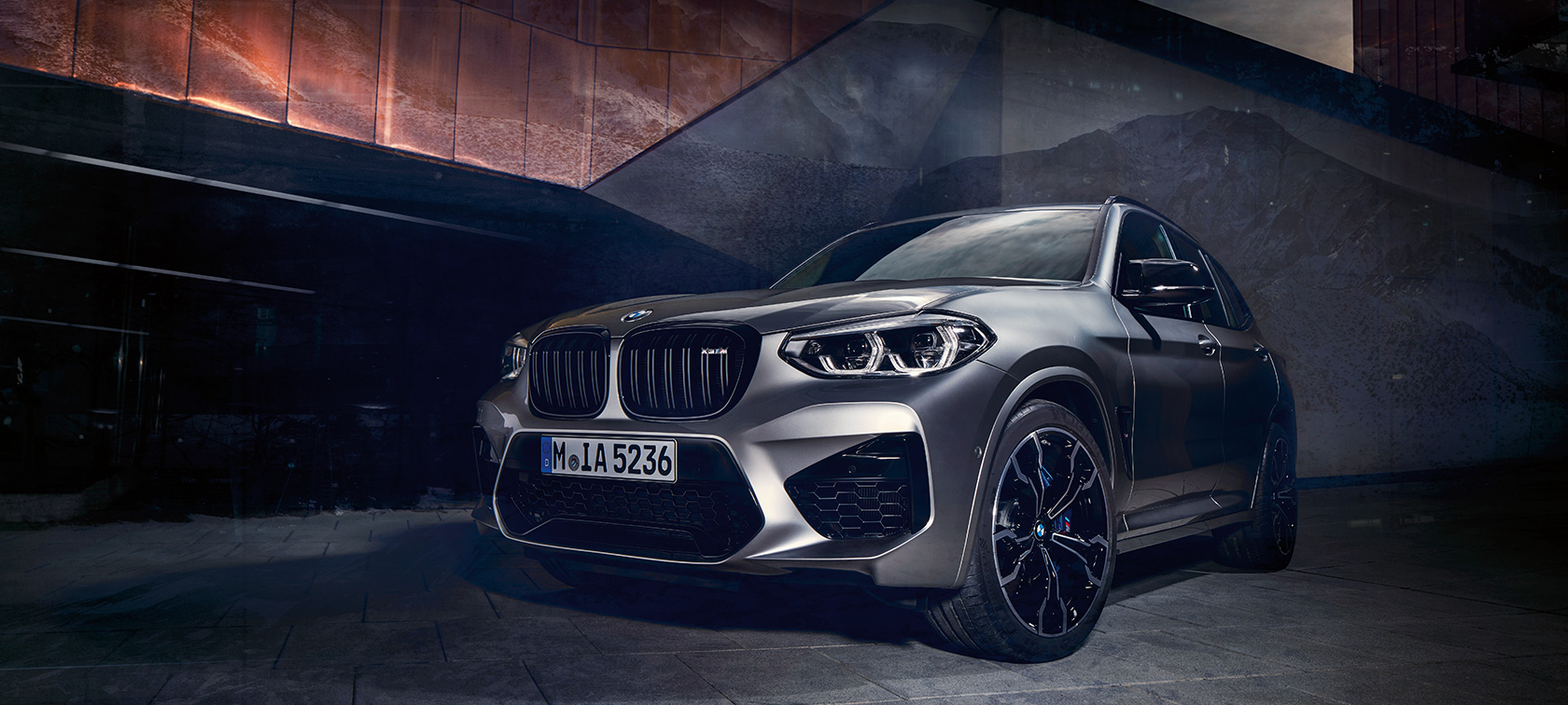 BMW X3 M Competition in Donington Grey metallic, exterior, three-quarter front view.