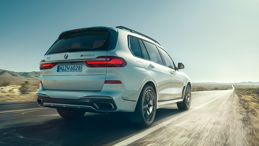 BMW X7 M50d, exterior, driving from three-quarter rear perspective, G07 2019
