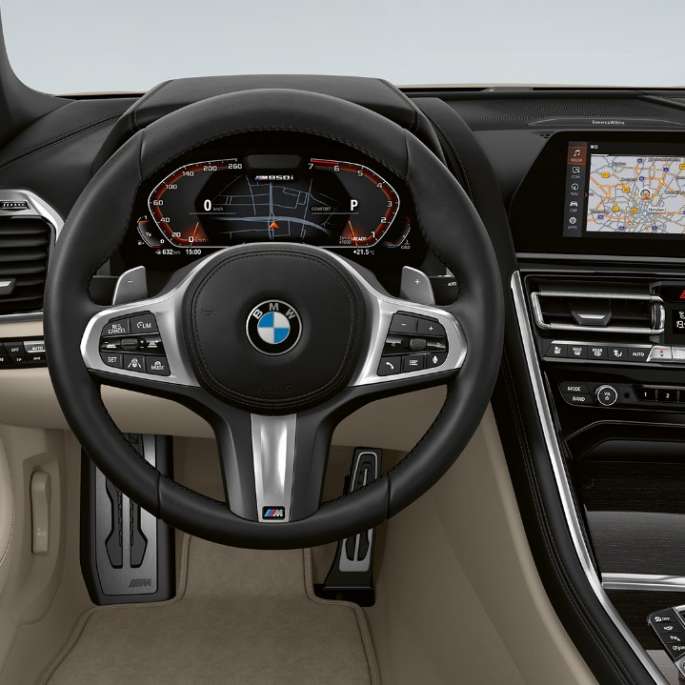 BMW M850i xDrive, Dravit Grey metallic, Cockpit with M leather steering wheel.
