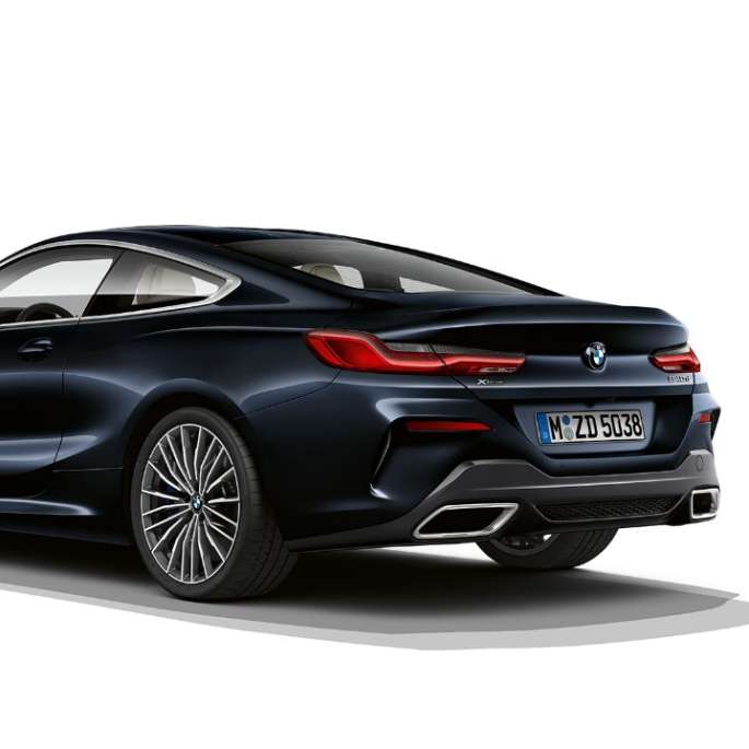 BMW 8 Series Coupé, Carbon Black metallic, three-quarter back view.